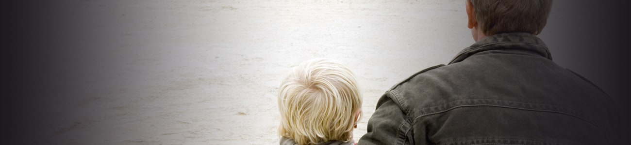 Banner picture of a kid and adult looking at horizon