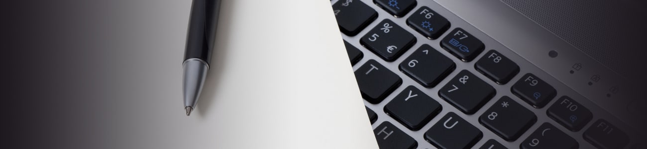 Banner picture of a pen over computer keyboard
